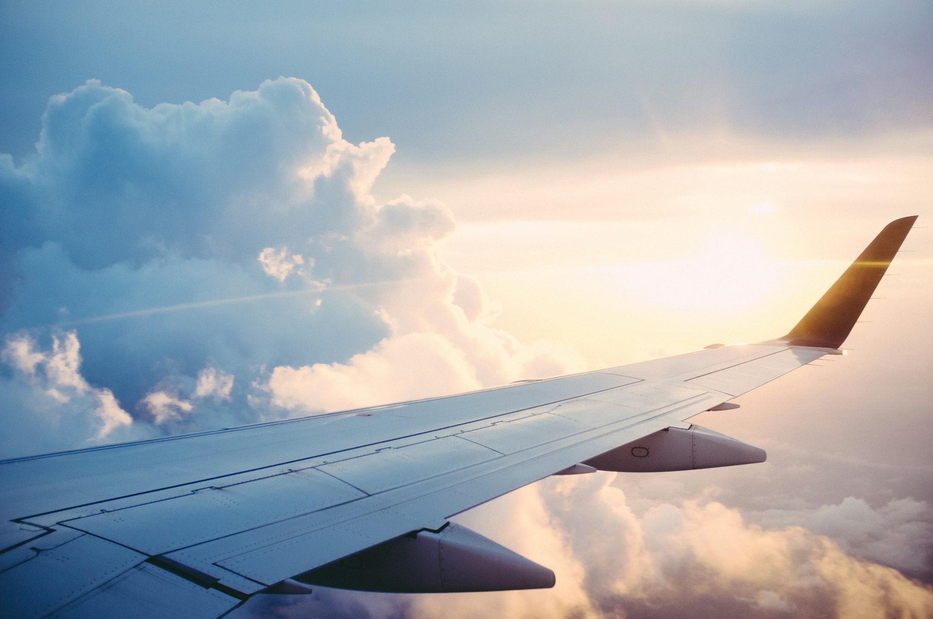 Sunset flight above the clouds